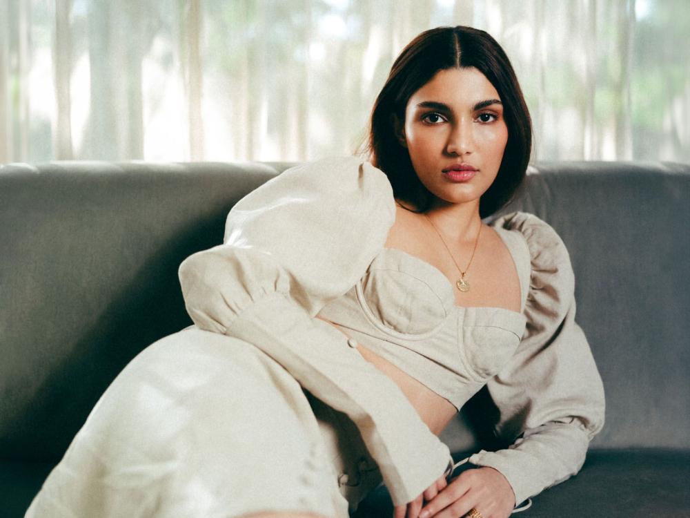 Alizeh Agnihotri in a linen midi skirt and top by Isa Boulder