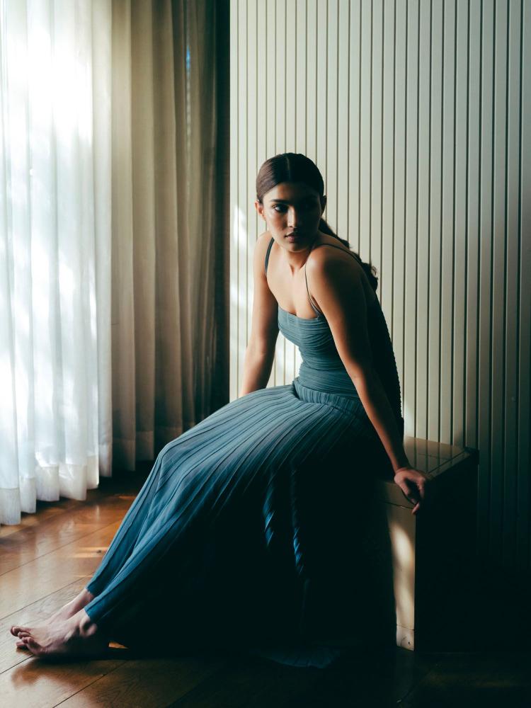 Bollywood actor Alizeh Agnihotri in a blue drop waist dress