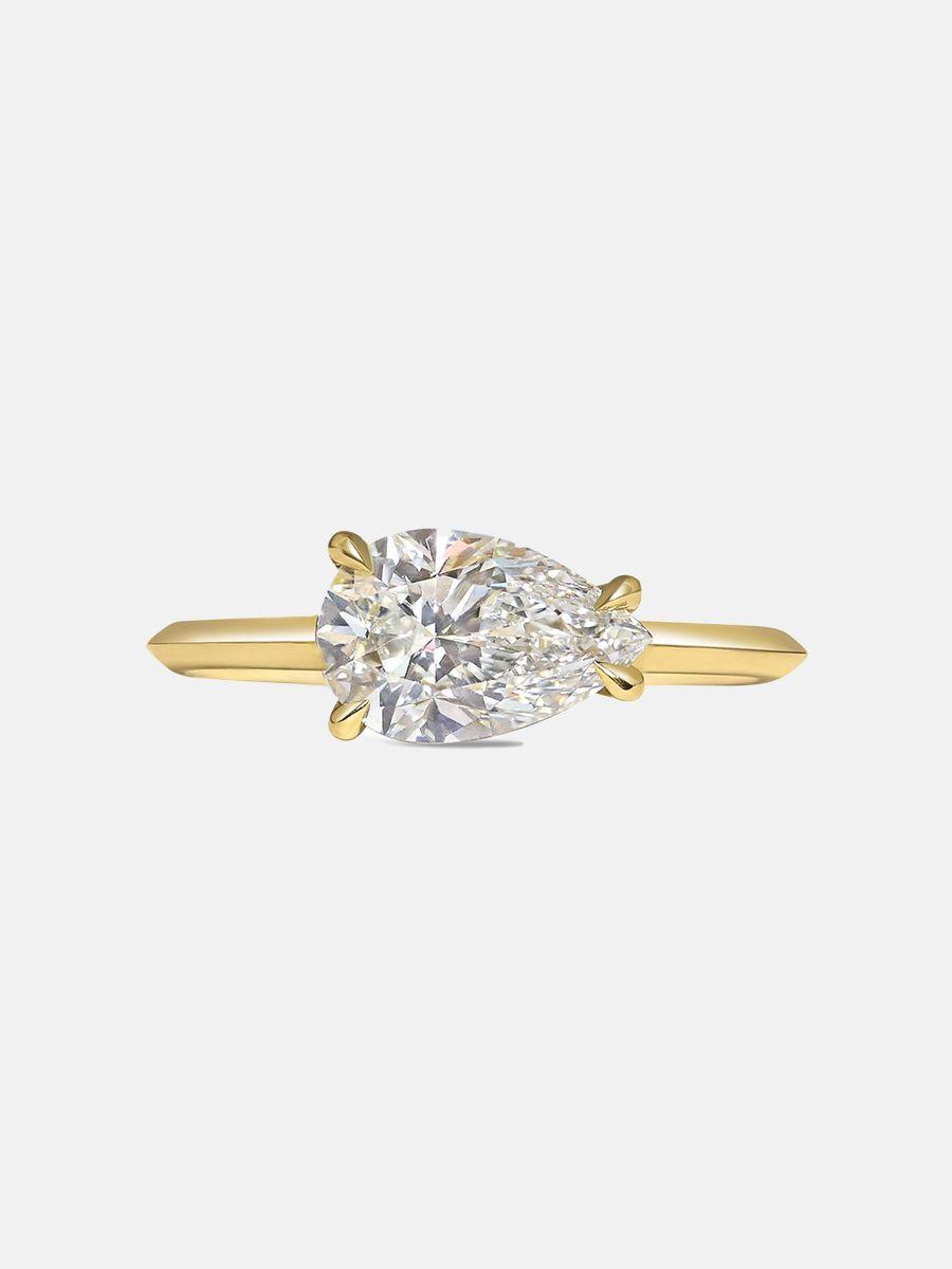 Rachel Boston Aisling ring featuring a pear cut diamond in east west setting