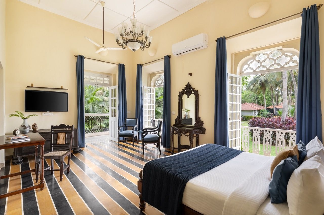 Rooms feature oyster-shell windows and hand-painted tiles
