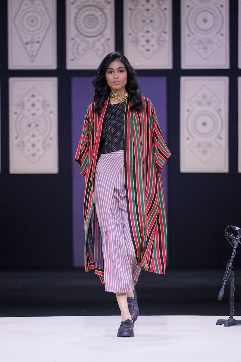 Runway look from her collection Alaicha at LFW