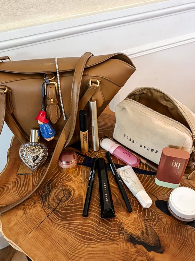 She loves a good cream blush from Merit and always carries a reliable lip kit consisting of Kiko Milano lip gloss and any Fenty Beauty lip liner