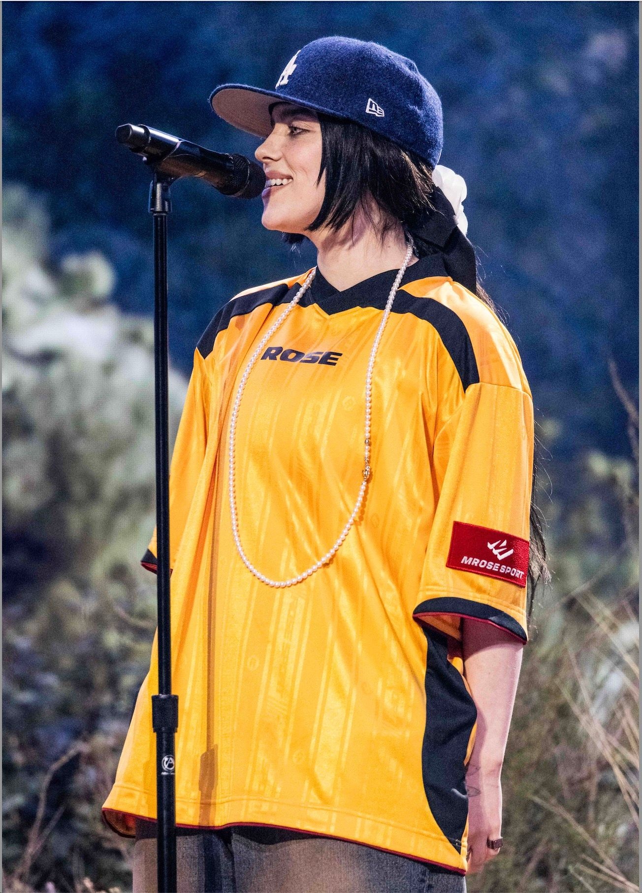 Billie Eilish performing at the 2025 Grammys with a Hime haircut