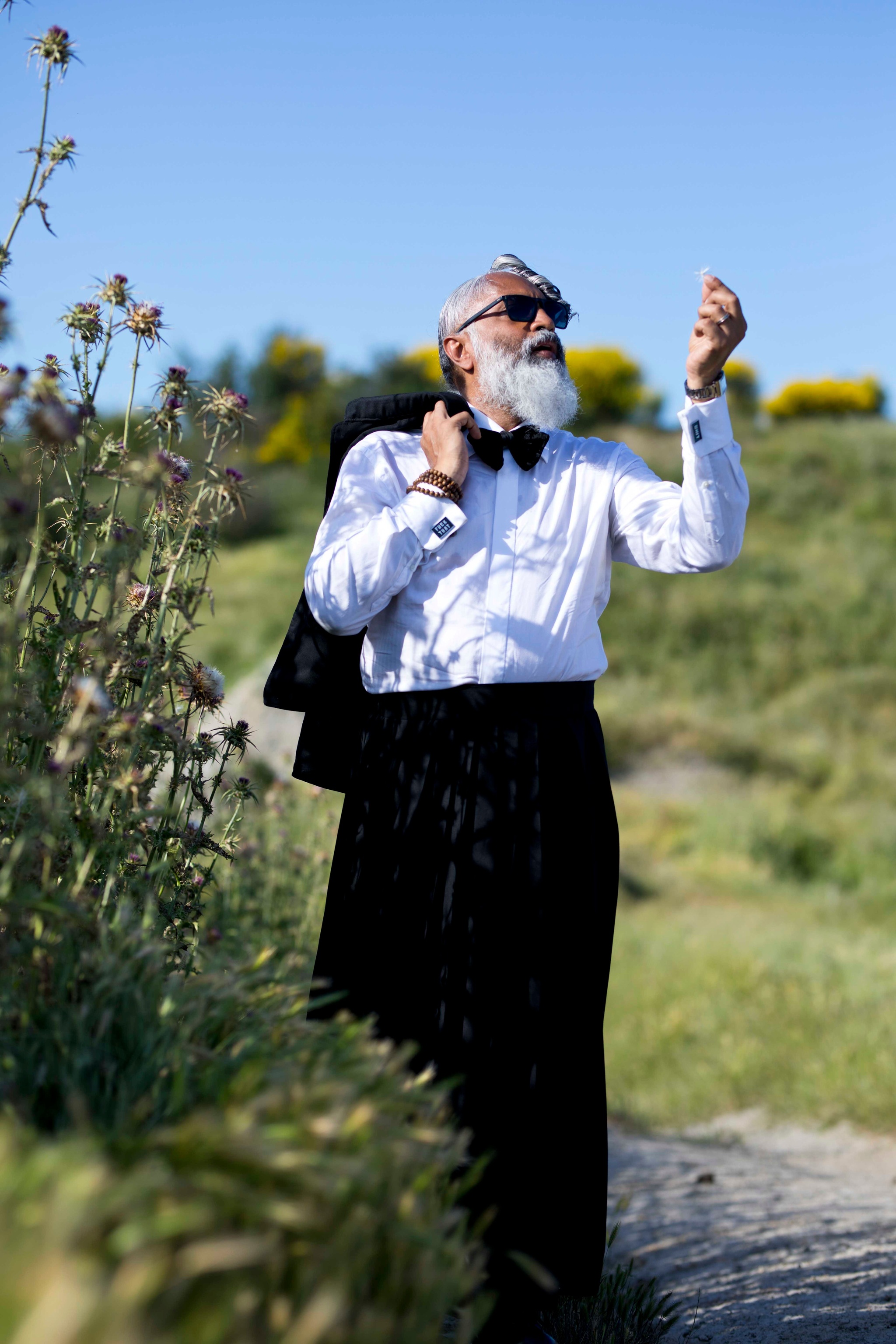 Terry Singh for a promotional shoot, donning a tuxedo 