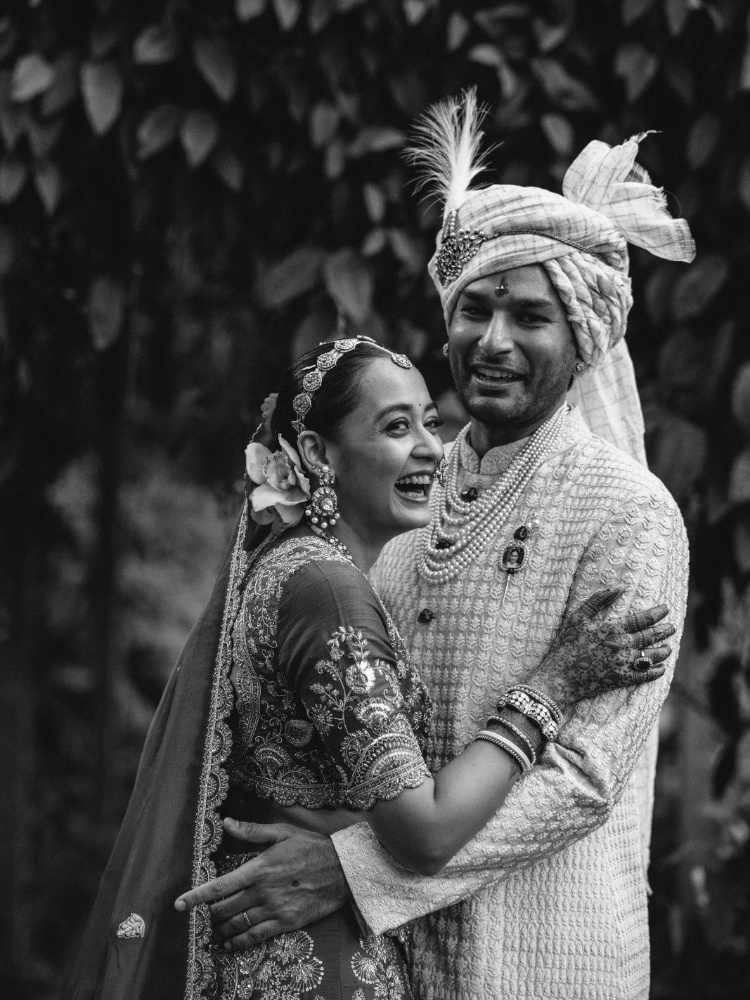 The bride Dhwani Kathotia and the groom Aman Poddar share a moment