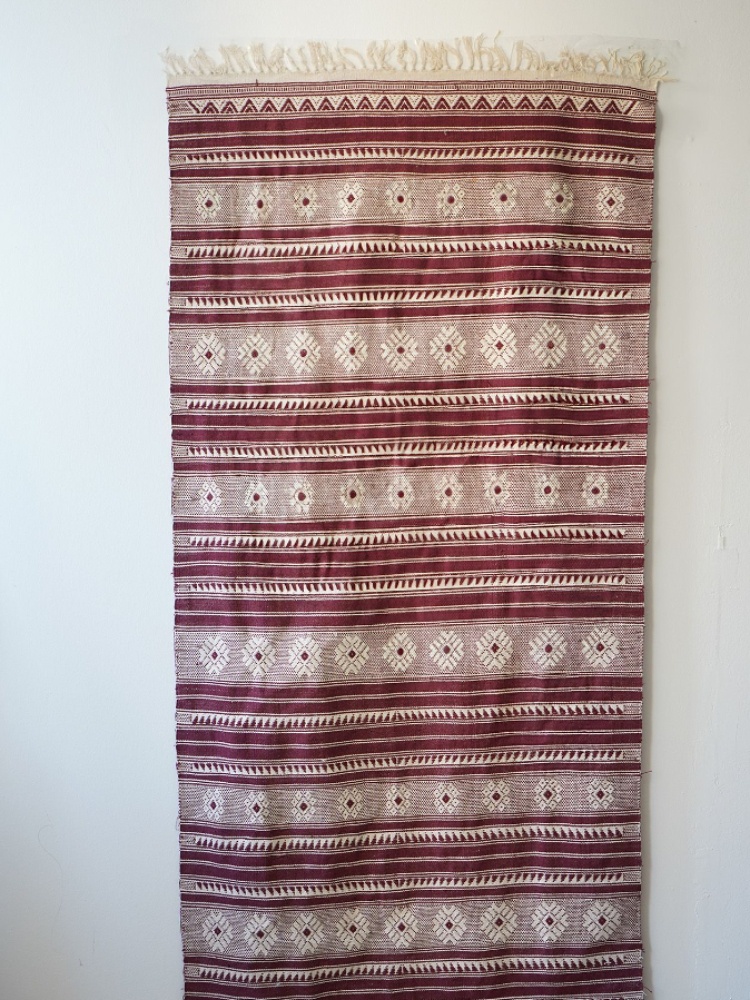 Niha Elety's handwoven rug created by the Nivucha tribal weaving cluster
