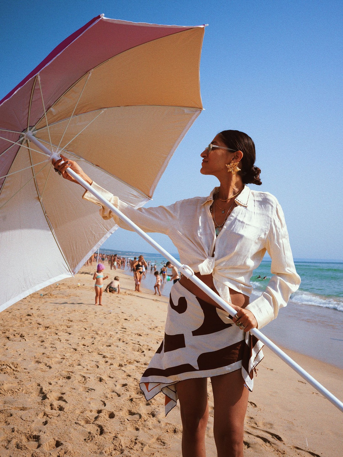 Stylist and creative director of Bodements Divya Saini wearing a Burberry scarf as a skirt
