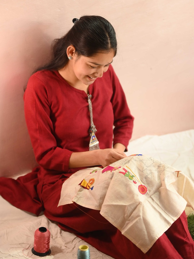 An embroidery artisan at work