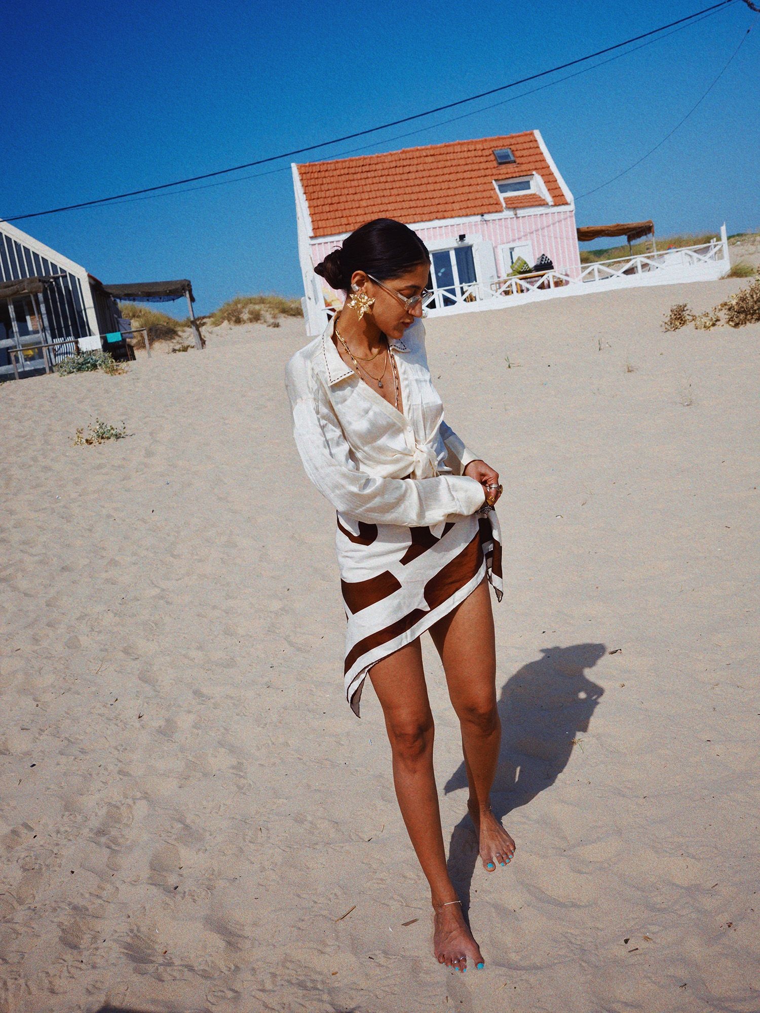 Stylist and creative director of Bodements Divya Saini shows The Nod how to style a scarf in many ways