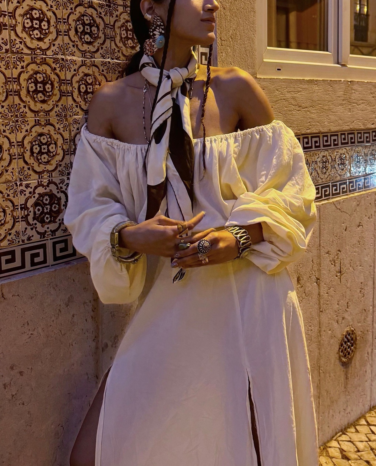 Stylist and creative director of Bodements Divya Saini wearing a Burberry scarf around her neck