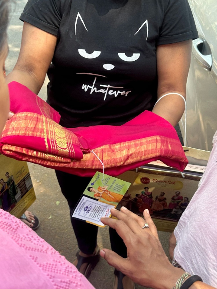 A successful customer shows off her wares