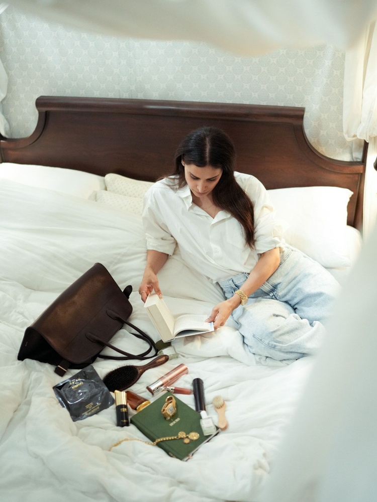 Neha Kapur reading a book