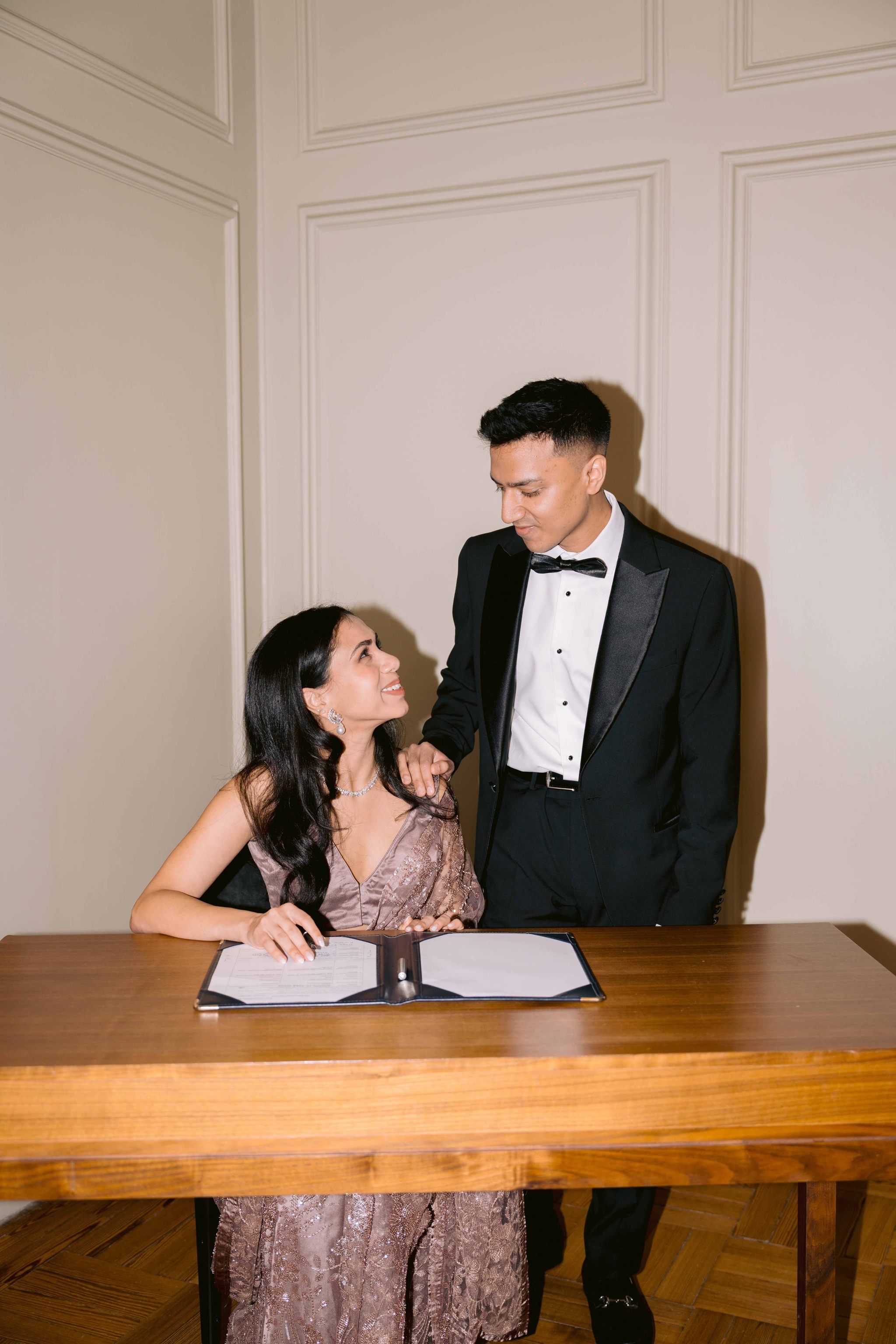 Meera and Ash during their civil ceremony at Old Marylebone Town Hall in Londo