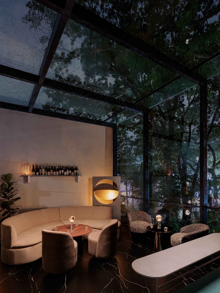 Moonjar features a glass wall ceiling in the dining area