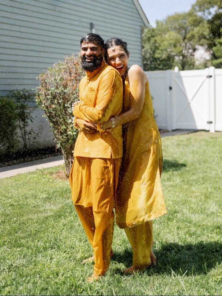 A moment at the haldi that took place at Kavaneet’s family’s home