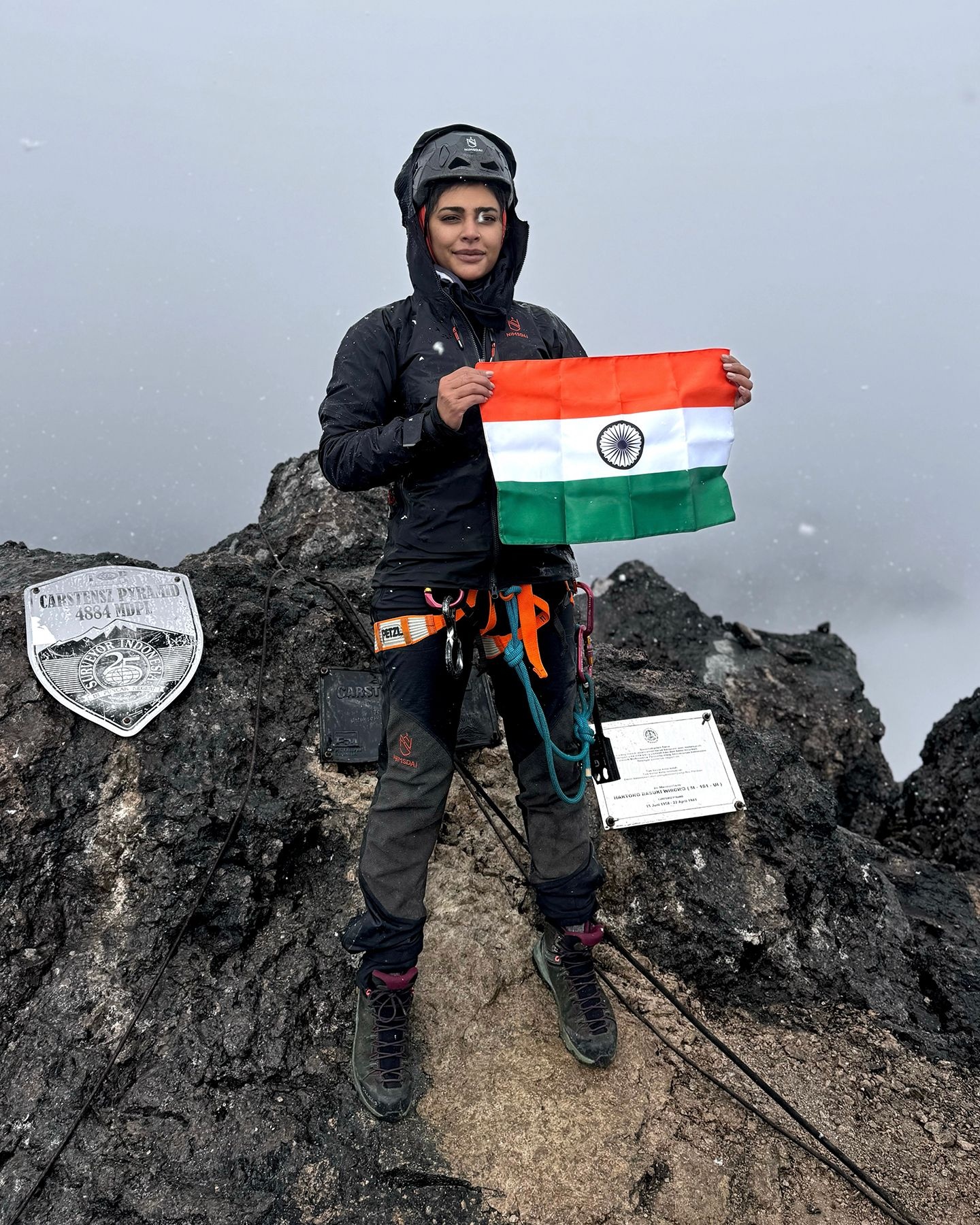 Rina Charanya at the top of the Carstensz Pyramid (Puncak Jaya)