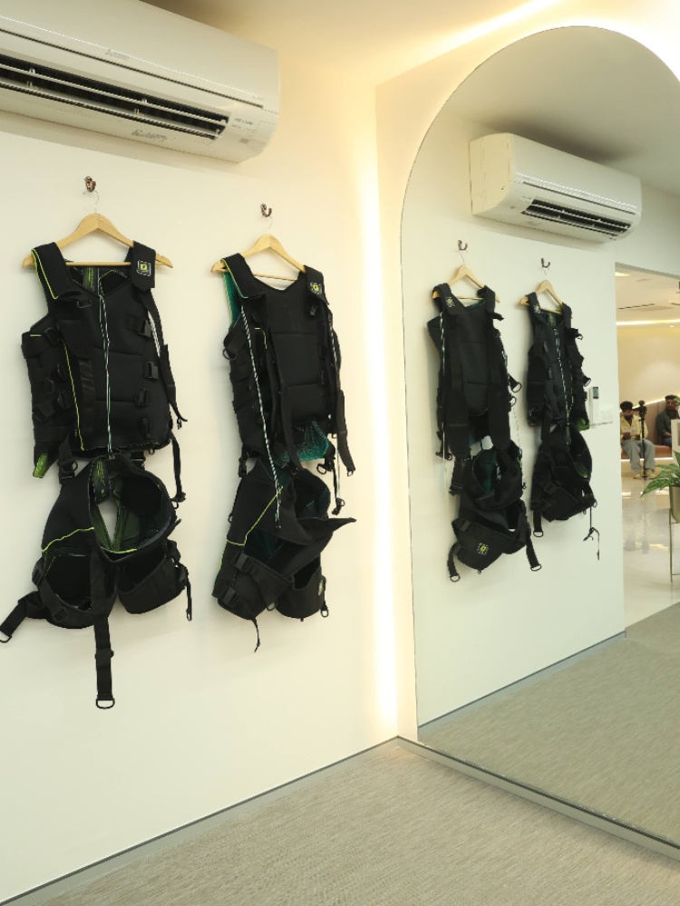EMS Suits hanging on the wall