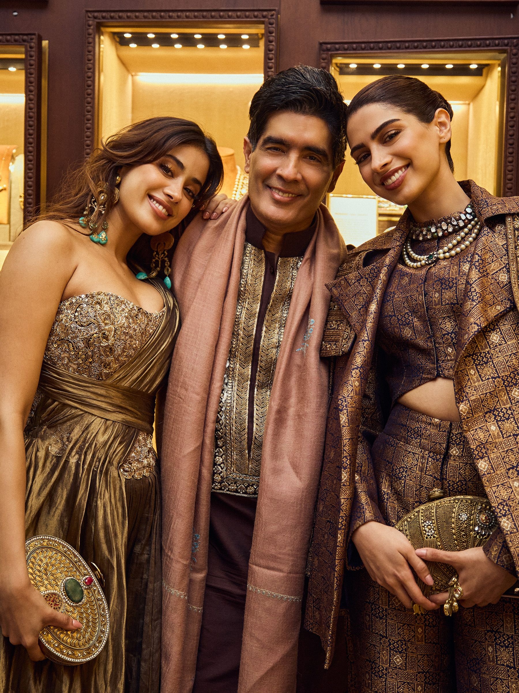 Janhvi Kapoor and Khushi Kapoor with designer Manish Malhotra for Swadesh event