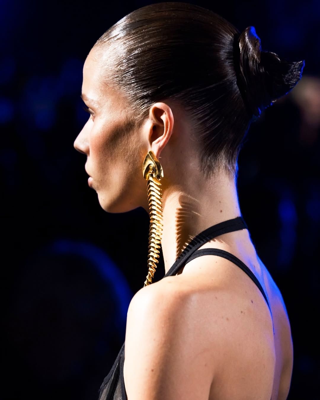 Schiaparelli fish skeleton earring on the spring 2025 ready-to-wear runway