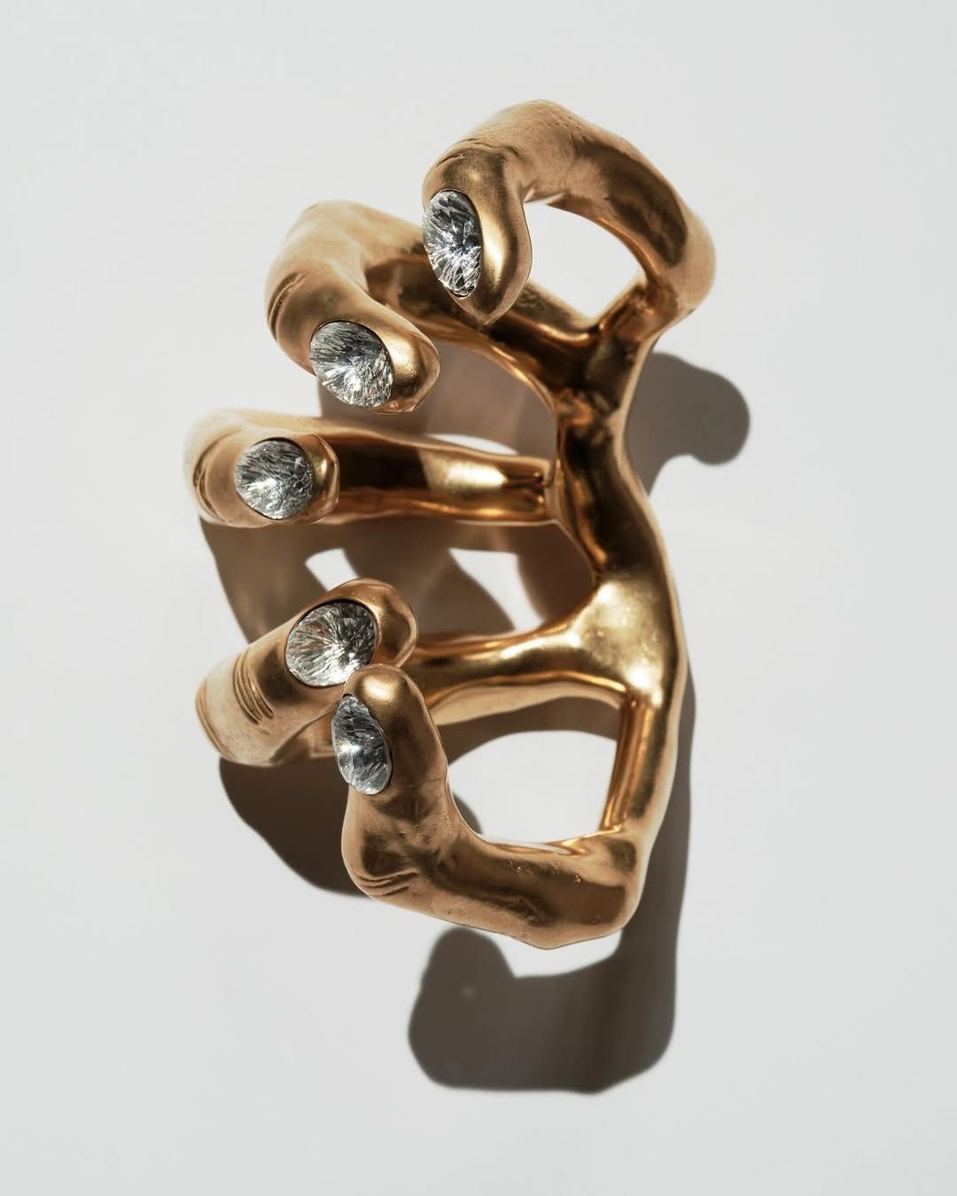 Schiaparelli's hand-in-hand ring