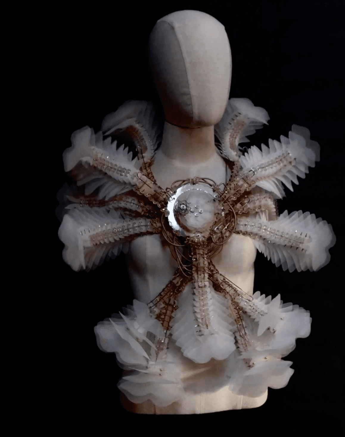A kinetic fashion sculpture titled Stella Pluma by Casey Curran, The Nod Mag