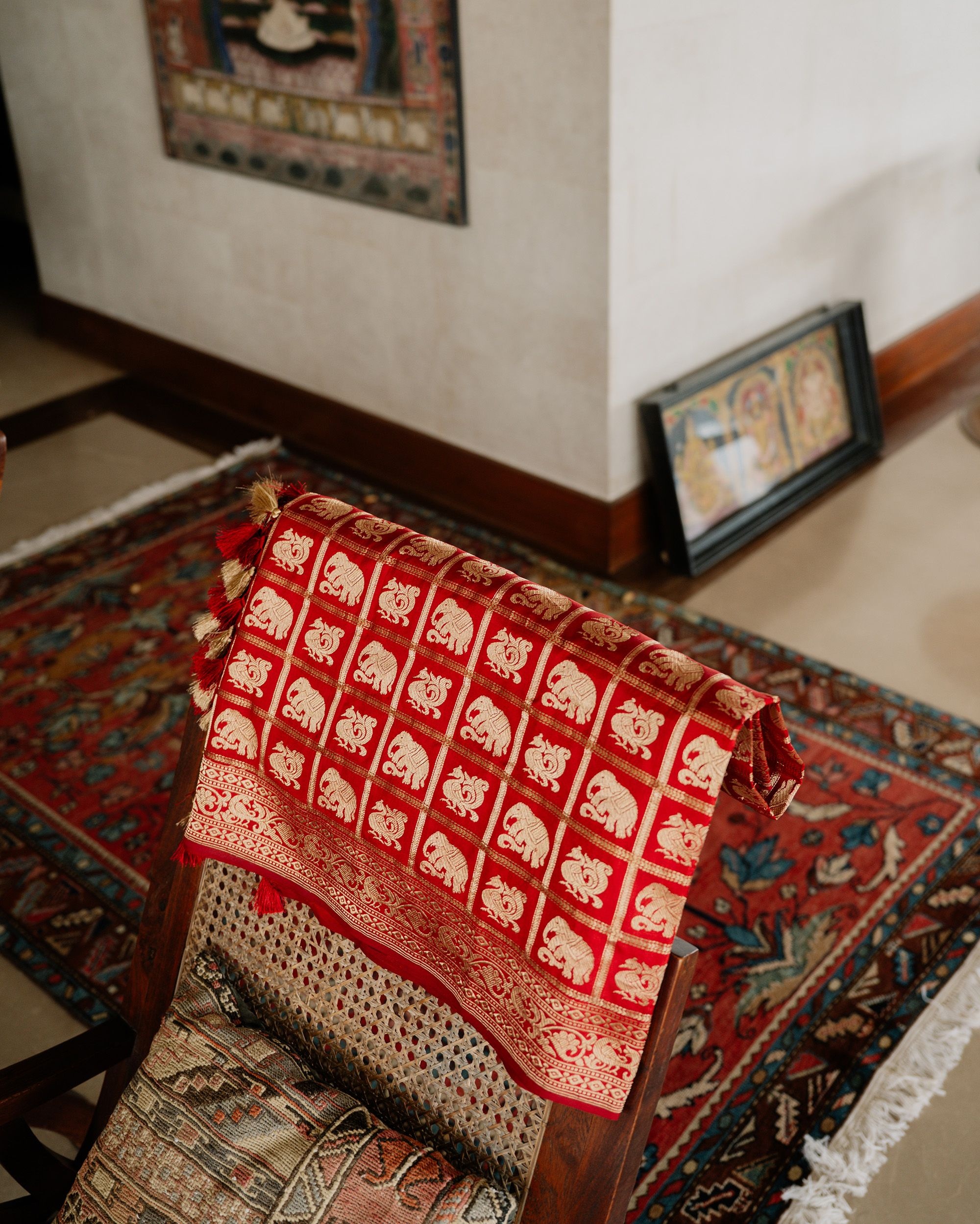 A red Shikargah sari by Sourav Das