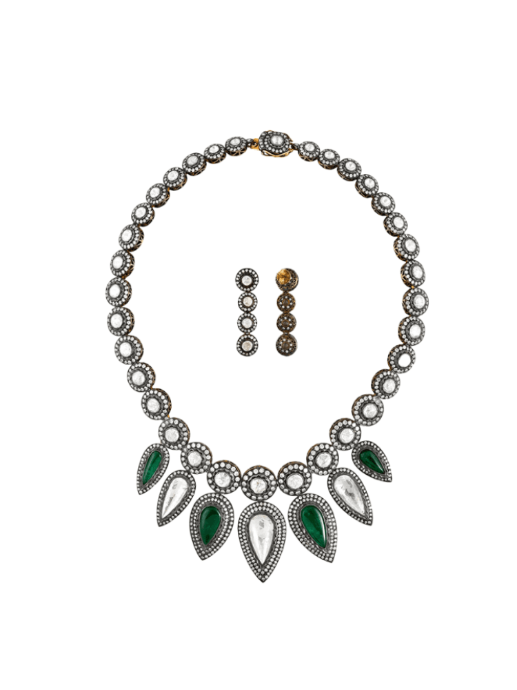 A diamond and emerald necklace that Tarang updated for Akanksha