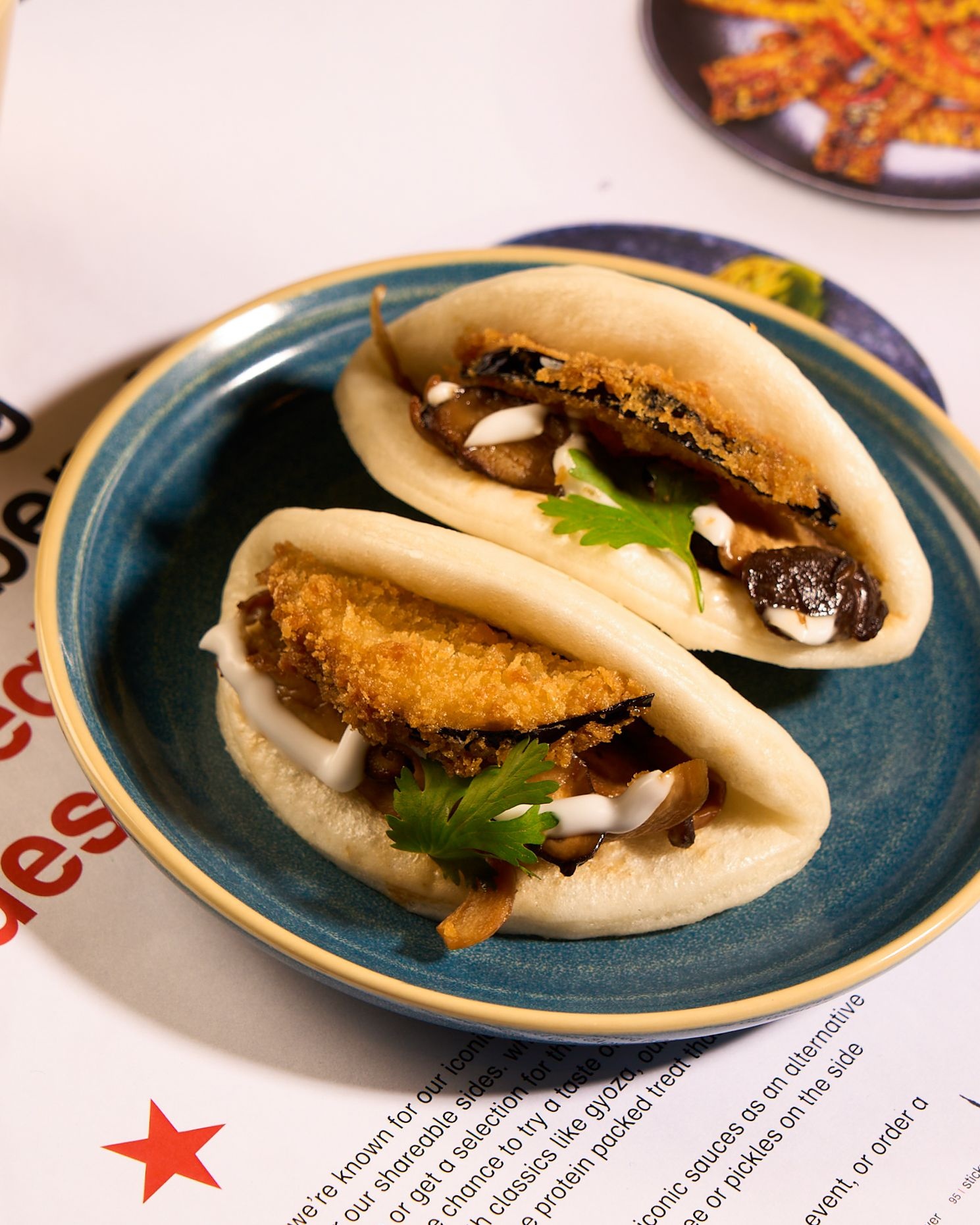Mixed mushroom and panko aubergine bao Mumbai Wagamama the Nod Mag