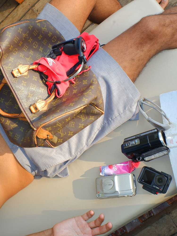 Inside Mishall's Louis Vuitton bag