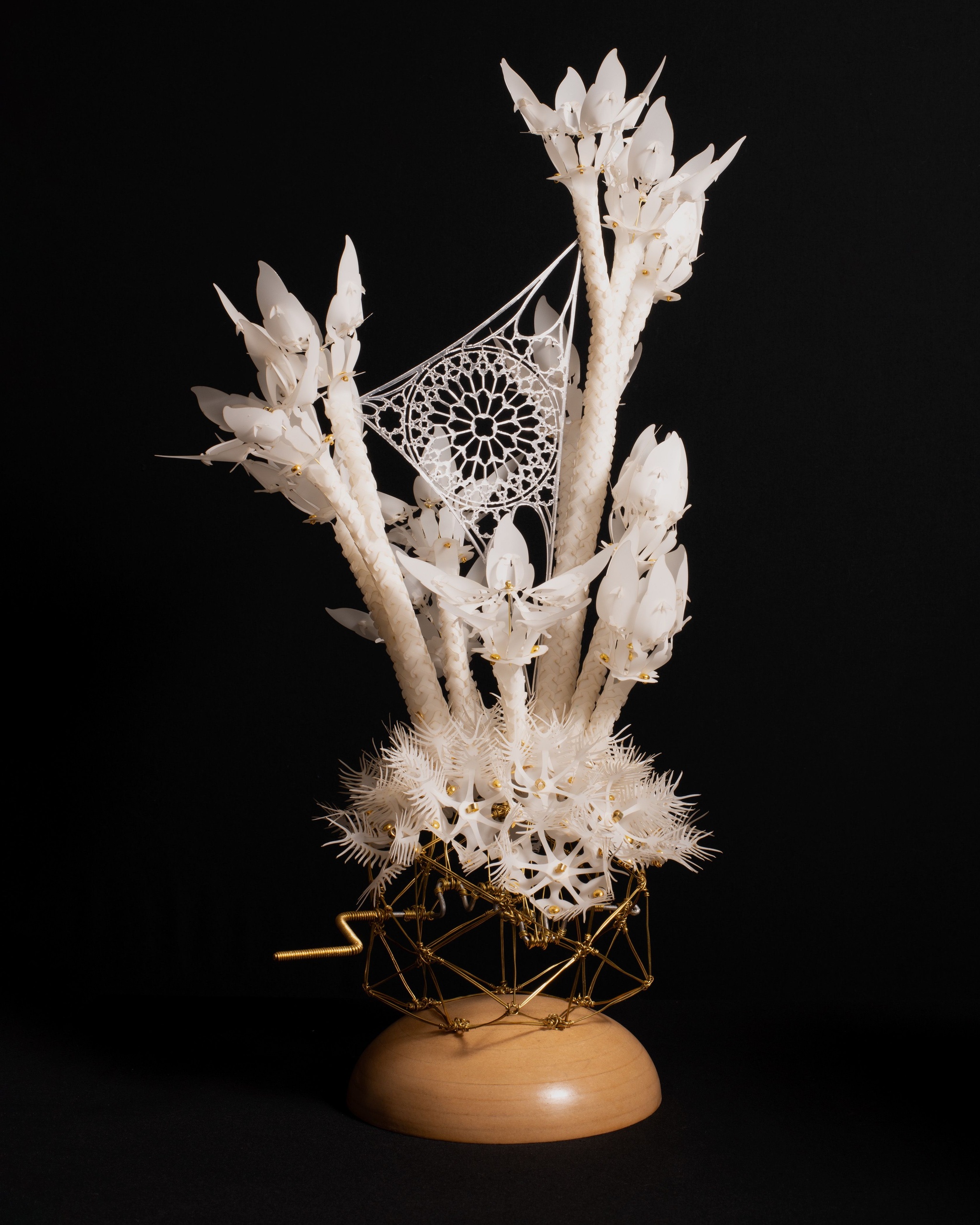 A kinetic sculpture titled Thin Threads by Casey Curran, The Nod Mag