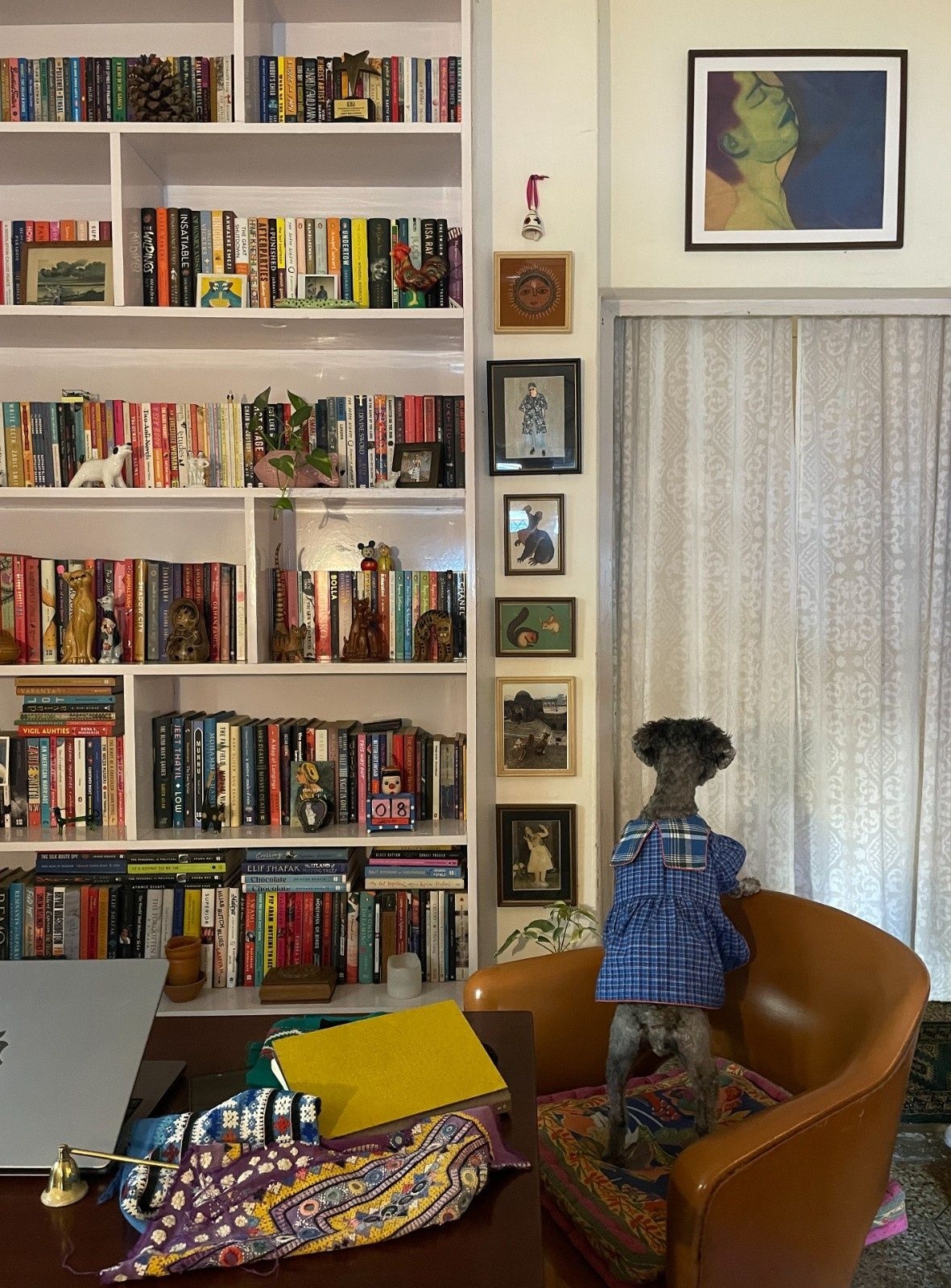Amit’s studio space, where he also works on book design projects, featuring his dogs Jugnu