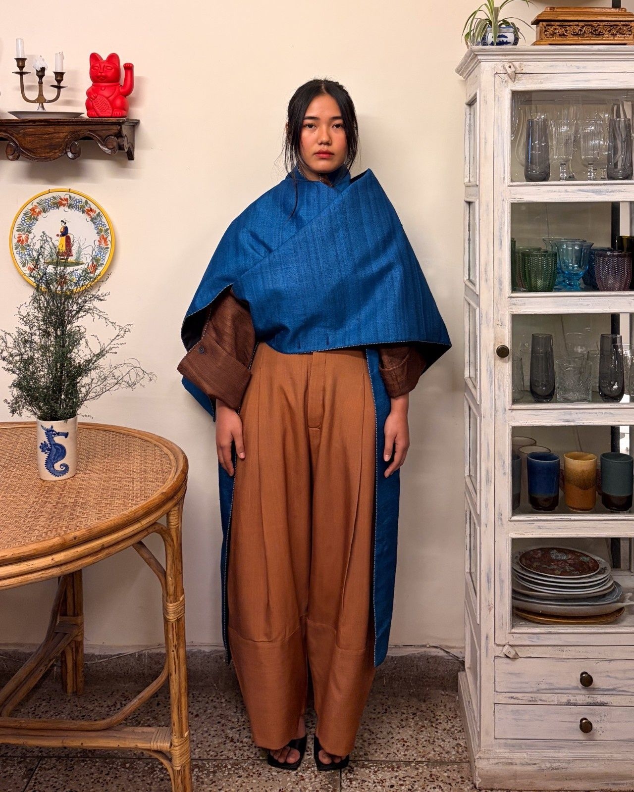 An unreleased double-breasted coat constructed to allow multiple ways of styling. Crafted from handwoven raw silk from Bihar