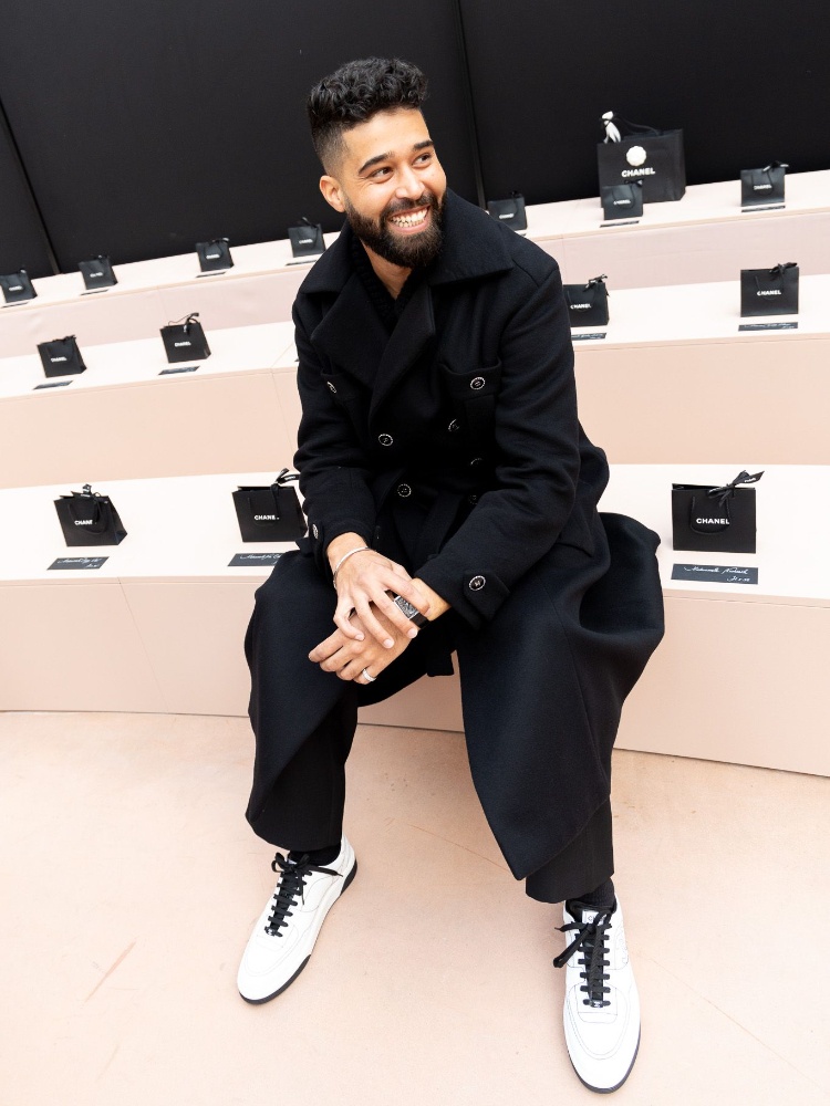 Singer AP Dhillon in a full Chanel look at the Chanel fall/winter 2025-2026 ready to wear show