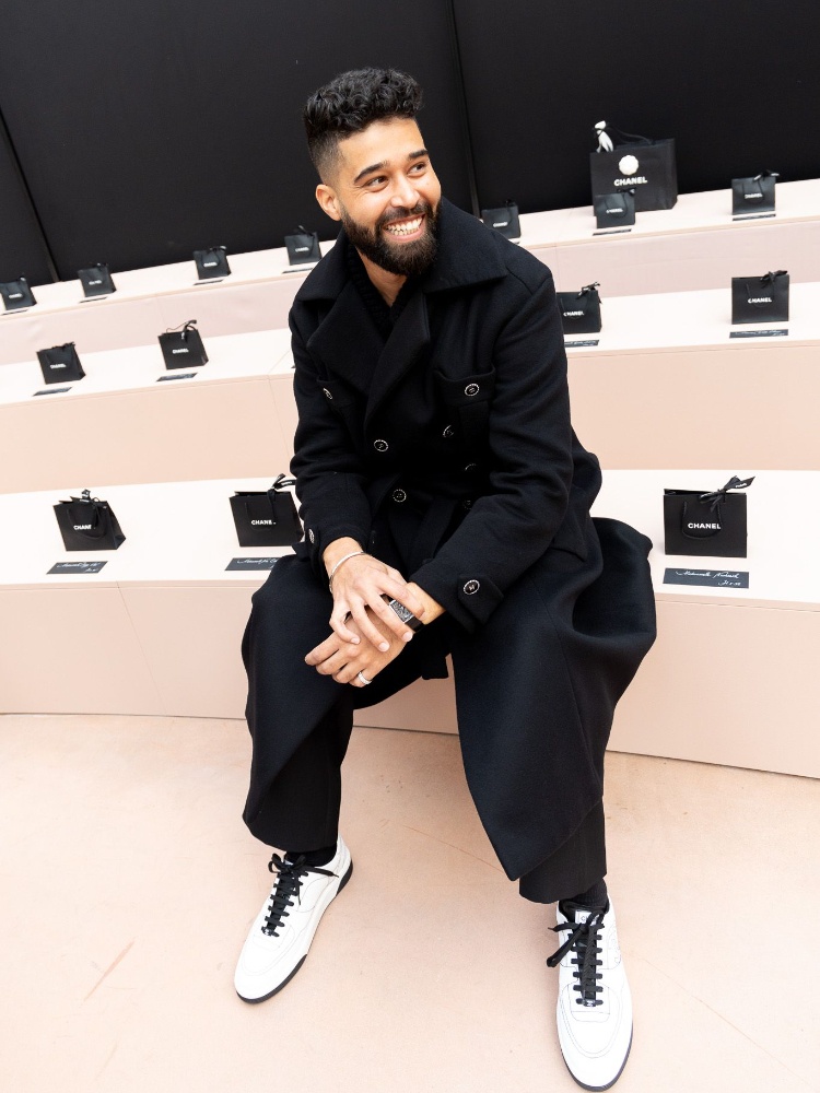 Singer AP Dhillon in a full Chanel look at the Chanel fall/winter 2025-2026 ready to wear show