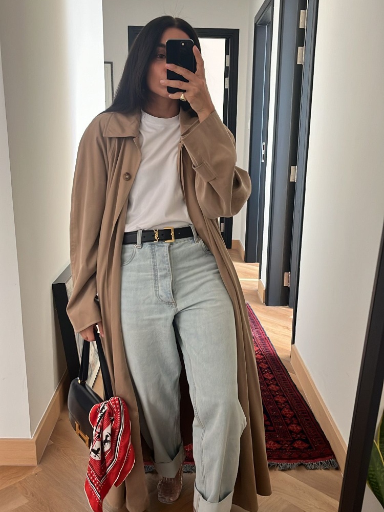 Personal stylist Amrita Singh in a white T-shirt, jeans, trench coat and an Hermes bag