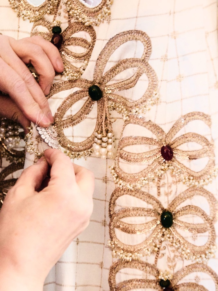 Bow details from Anamika Khanna's custom outfit for Isha Ambani at the 2025 Met Gala