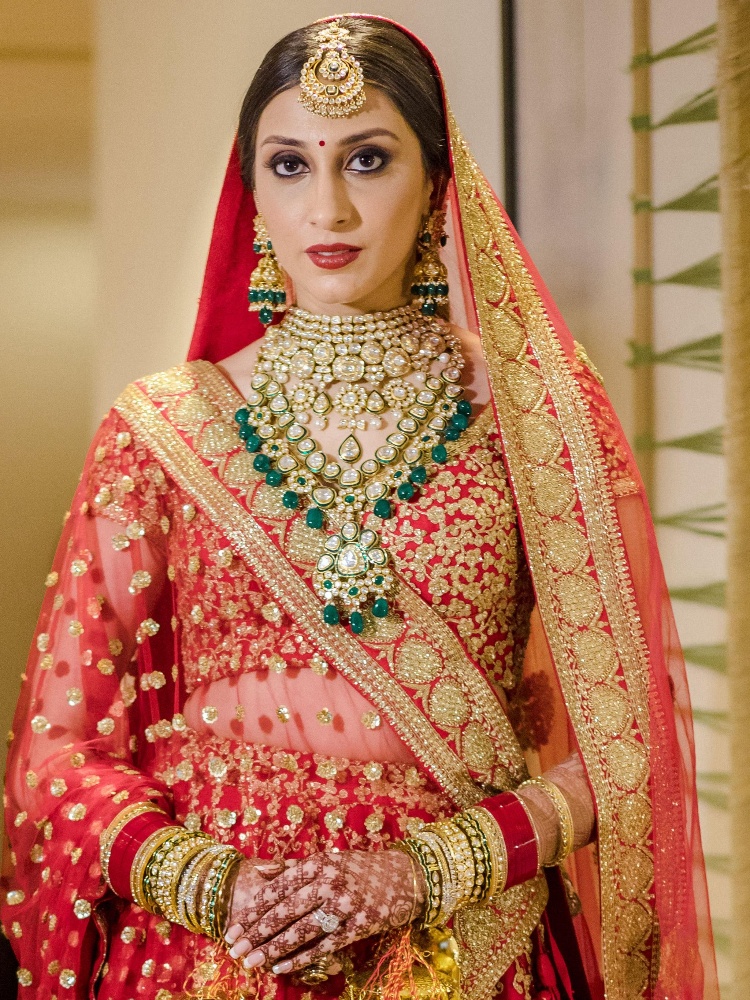 Anissa Malhotra Jain wore an emerald and polki diamond set for her wedding