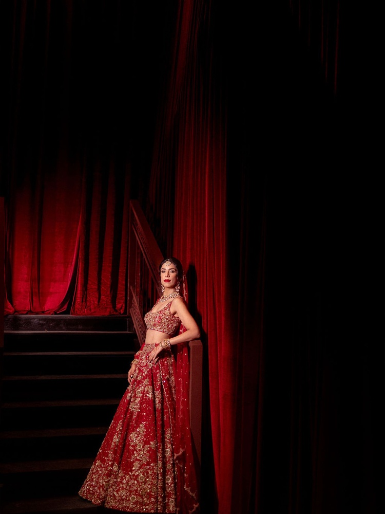 Anjali Batra in a custom red lehenga from A&R by Rhea Kapoor