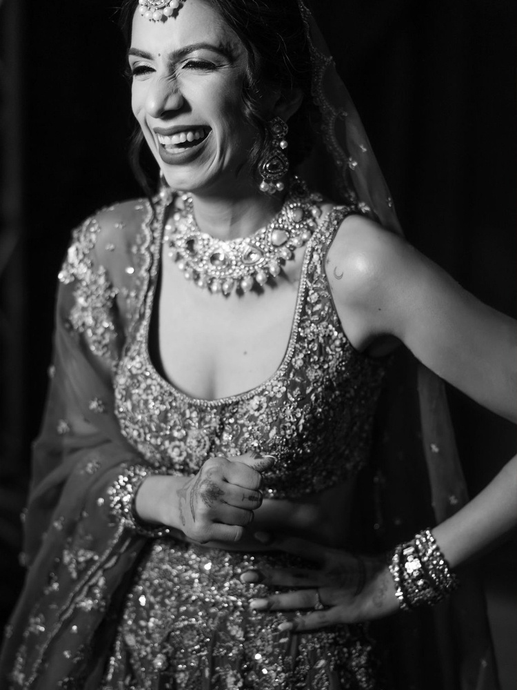 Anjali Batra in a custom red lehenga from A&R by Rhea Kapoor