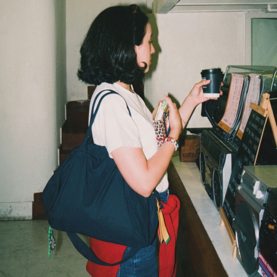 Anushka Tata with her Uniqlo C drawstring bag
