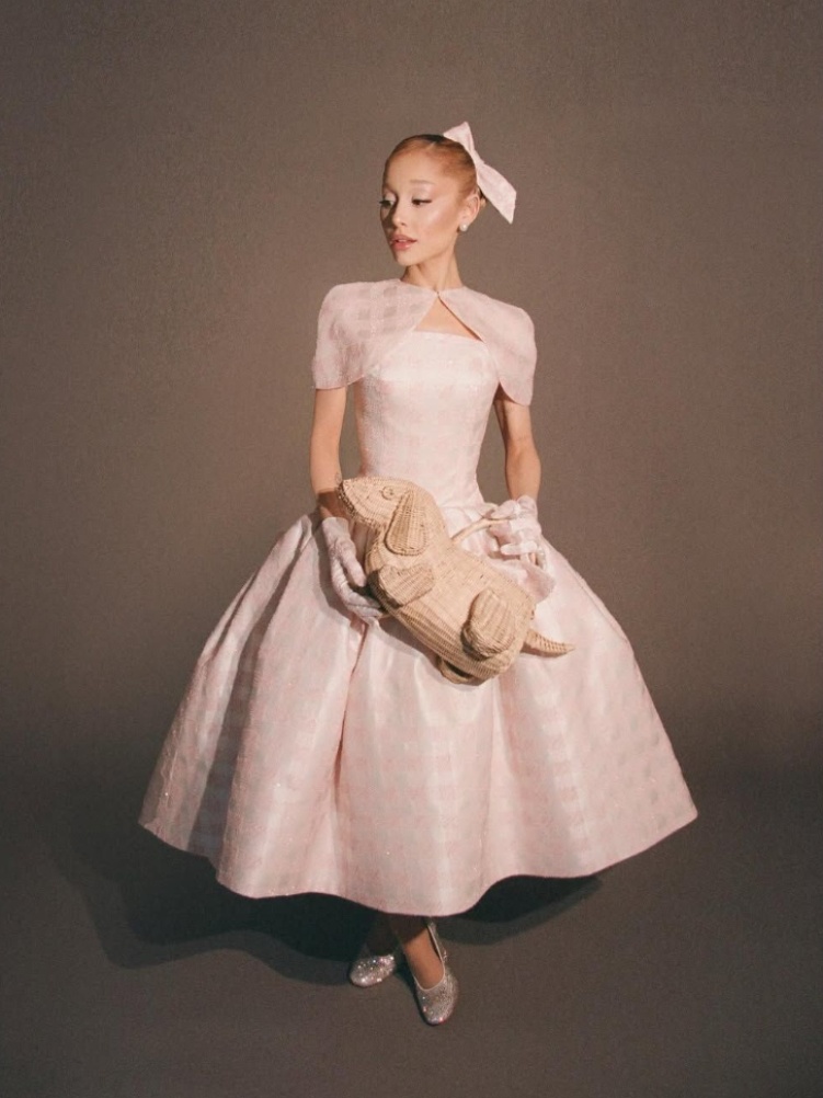 Ariana Grande carries a mini Hector wicker basket bag for the Wicked premiere in Los Angeles