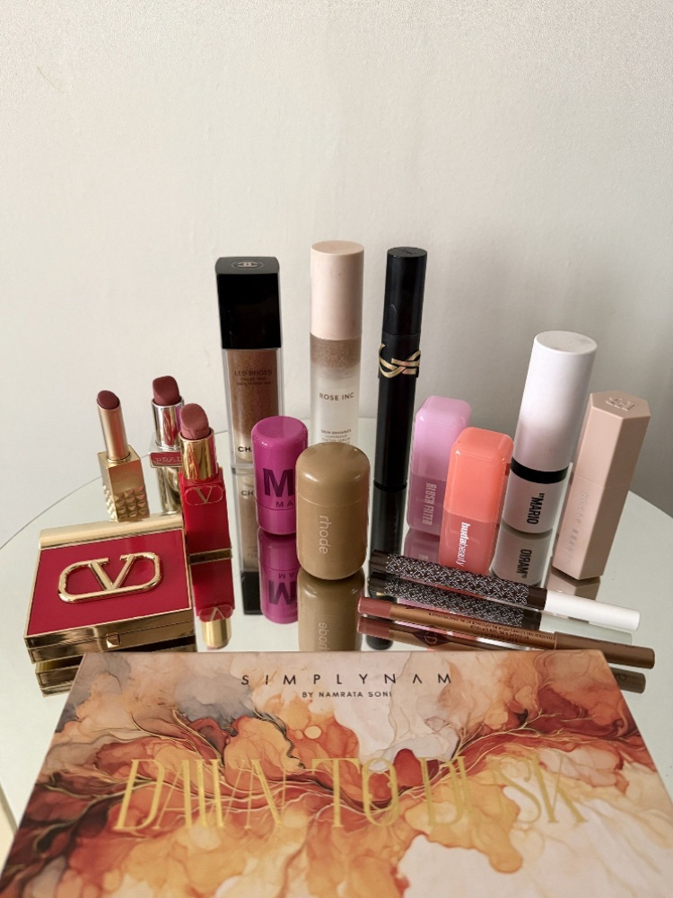Designer Arpita Mehta's makeup essentials include Rose Inc and Chanel skin tints, Huda Beauty and Rhode blushes, and a Simply Nam eyeshadow palette