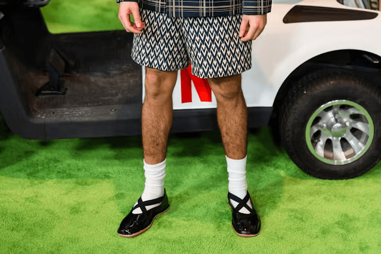 Bad Bunny in black ballet flats