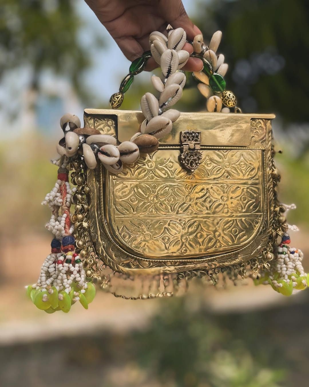 Bejeweled Jewels Antique ghungroo batwa metal bag with beads and shells