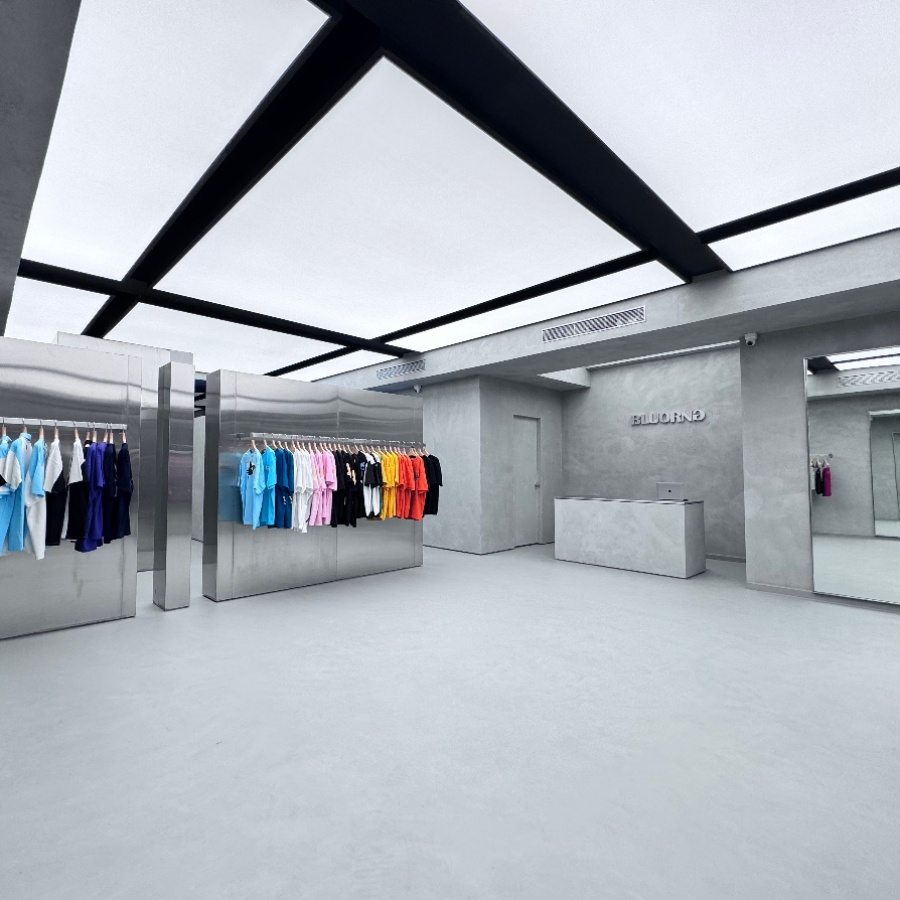 Bluorng’s garments punctuate the grey-and-steel palette with colour