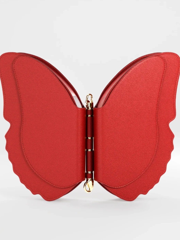 The Butterfly Bag by Peter & James can be worn as a backpack