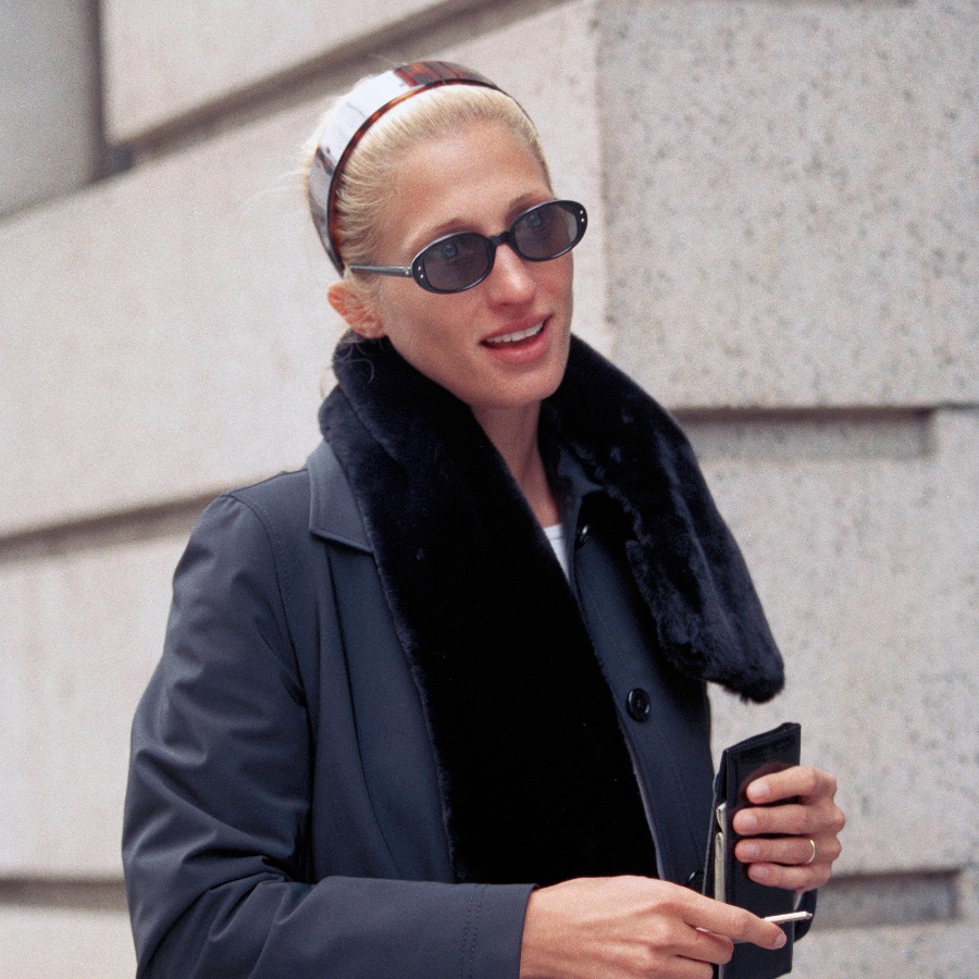 Carolyn Bessette-Kennedy wearing a tortoiseshell acetate headband which she reportedly bought from C. O. Bigelow in New York