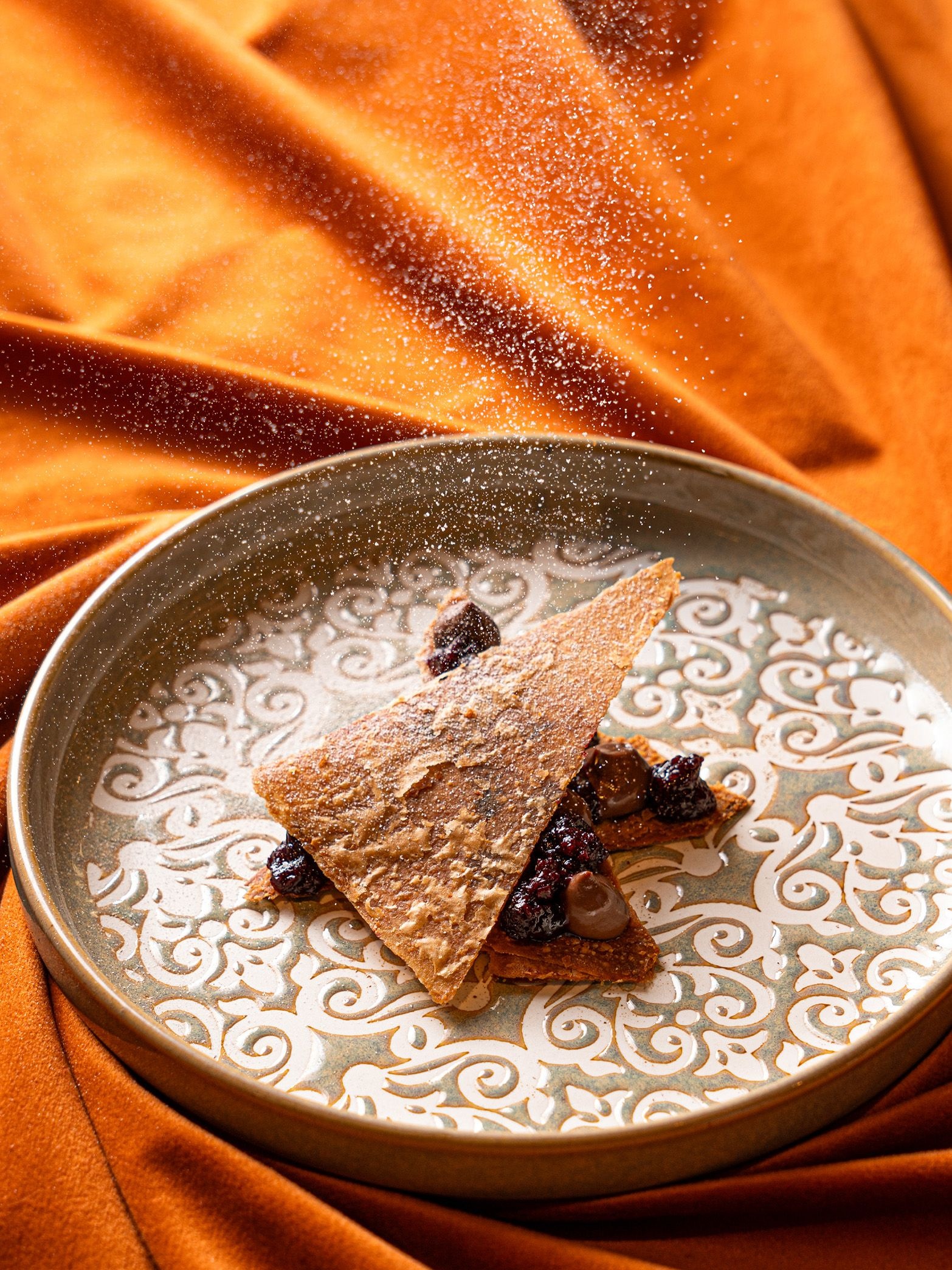 Cochin chocolate pudding Mille-feuille with pepper cherry jamThe Silver Train Mumbai The Nod