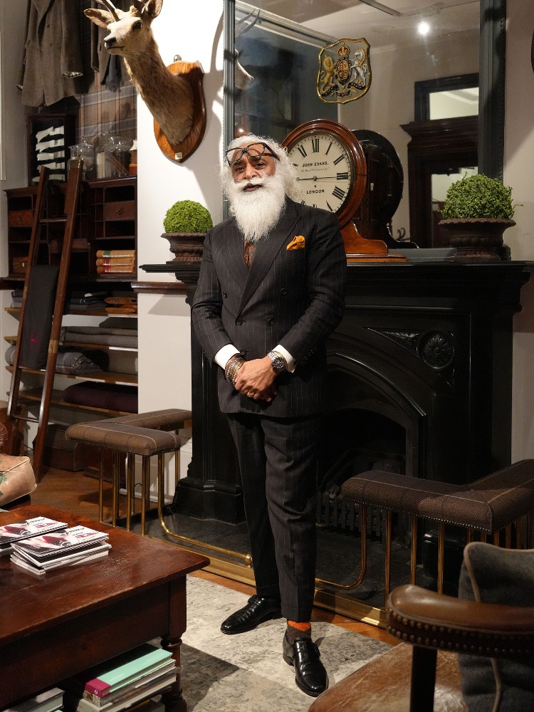 Suresh Singh, aka the Cockney Sikh wearing a tailored suit