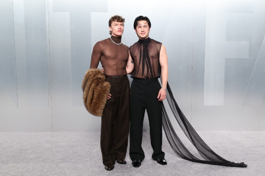 Connor Storrie and Hudson Williams attend the Vanity Fair Oscars afterparty in sheer outfits